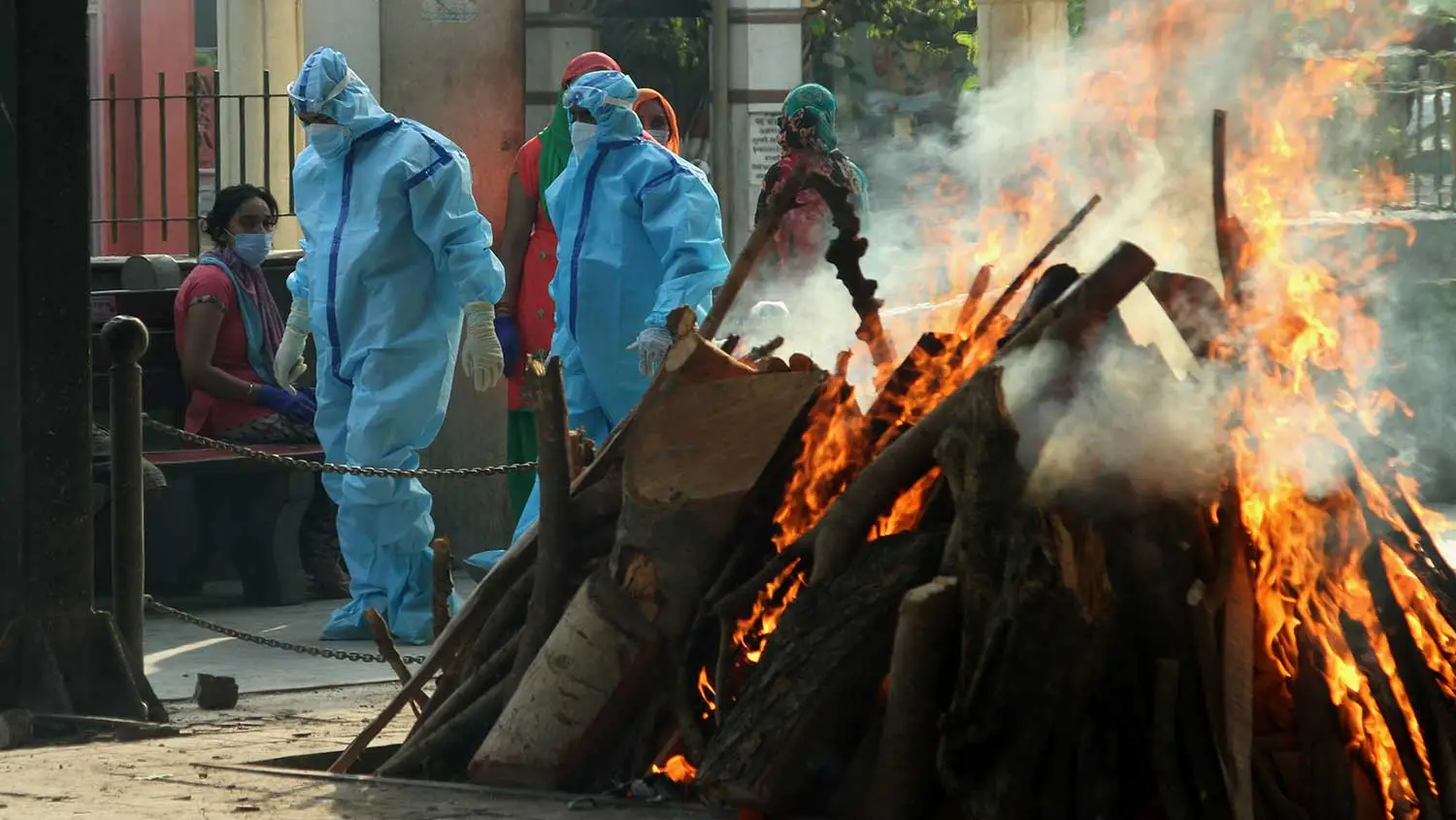 How Companies Can Help End the Global Cycle of COVID-19