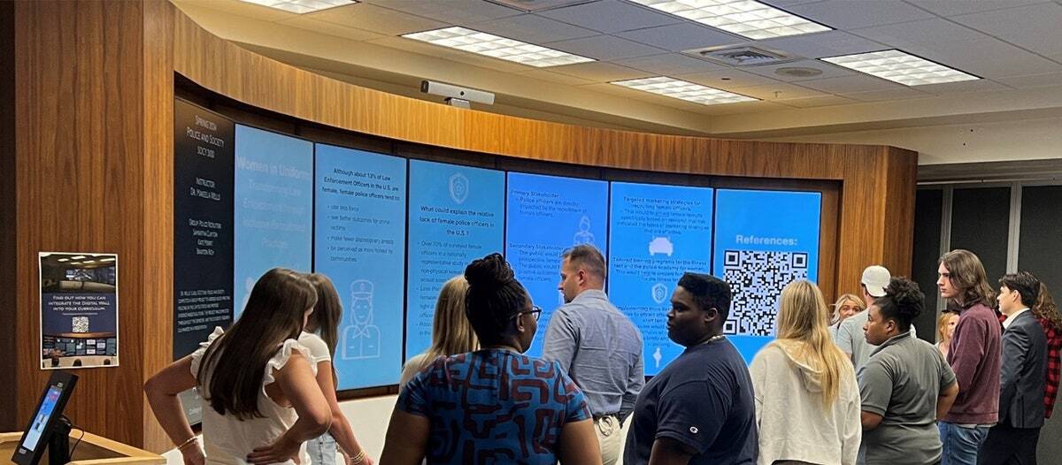 Auburn University students build workforce skills and explore the role of police in society with the help of Adobe Express